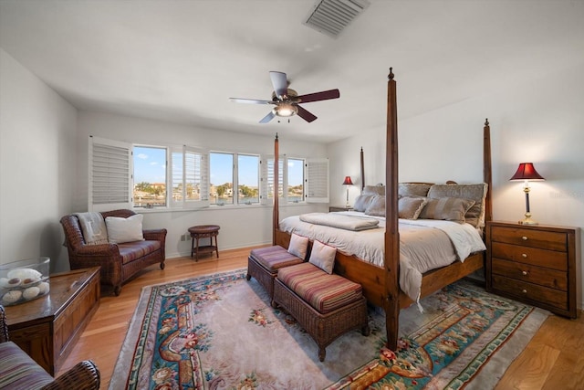 bedroom featuring light hardwood / wood-style flooring and ceiling fan