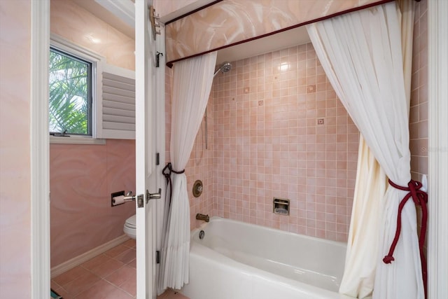 18 Winston Dr, Belleair, FL 33756 - full bathroom with shower / bath combo, toilet, tile patterned flooring, and baseboards