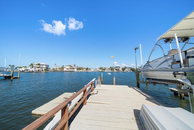 18 Winston Dr, Belleair, FL 33756 - dock featuring a water view and boat lift