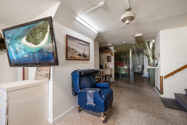 18 Winston Dr, Belleair, FL 33756 - sitting room featuring speckled floor, baseboards, a textured ceiling, and stairs