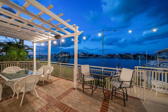 18 Winston Dr, Belleair, FL 33756 - view of patio with outdoor dining area, a water view, a pergola, and a boat dock