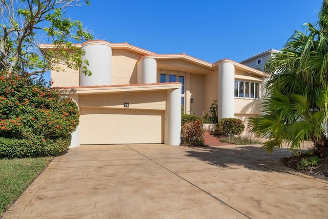 18 Winston Dr, Belleair, FL 33756 - art deco house with concrete driveway and stucco siding