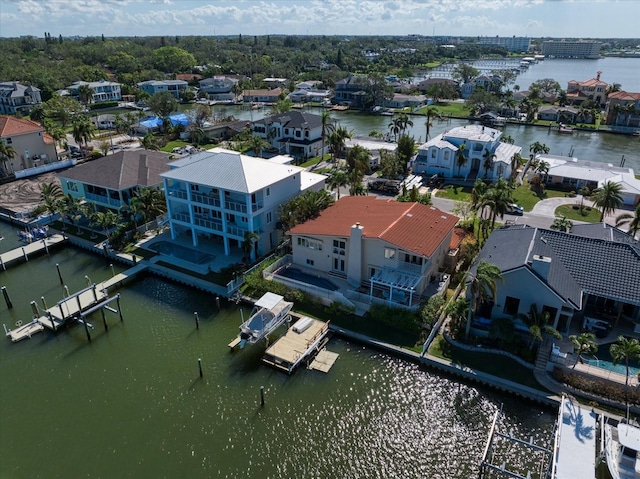 18 Winston Dr, Belleair, FL 33756 - aerial perspective of suburban area with a large body of water