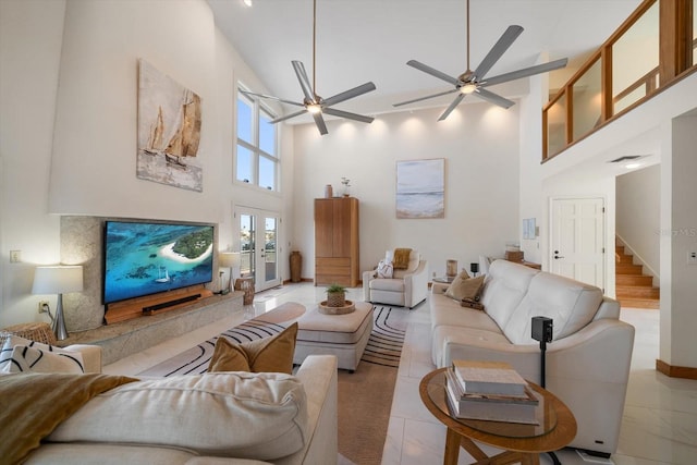 18 Winston Dr, Belleair, FL 33756 - living area featuring high vaulted ceiling, a ceiling fan, stairs, and baseboards