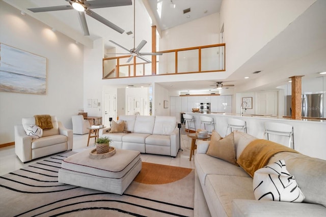18 Winston Dr, Belleair, FL 33756 - living area featuring ceiling fan and a high ceiling