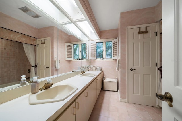 18 Winston Dr, Belleair, FL 33756 - bathroom featuring tile patterned flooring and double vanity
