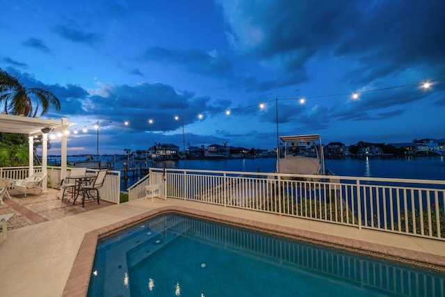 18 Winston Dr, Belleair, FL 33756 - view of pool featuring boat lift, a boat dock, a water view, and a patio area