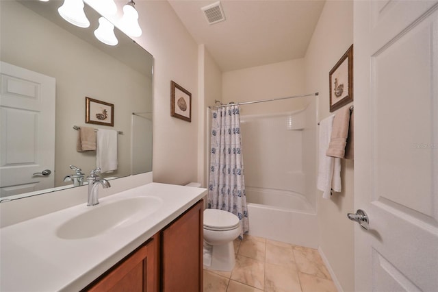 full bathroom with tile patterned floors, vanity, shower / tub combo, and toilet