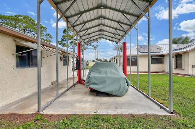 view of vehicle parking featuring a yard