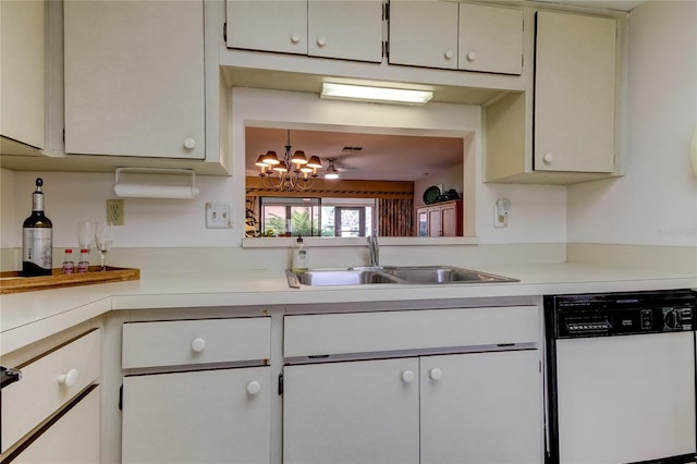 kitchen with dishwasher, a chandelier, and sink