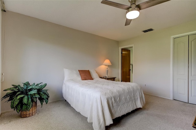 bedroom featuring carpet, a closet, and ceiling fan