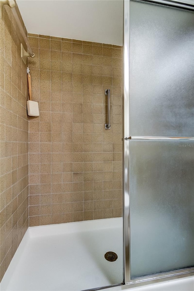 bathroom featuring walk in shower