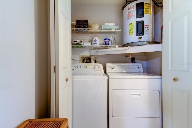 laundry area featuring washer and dryer and electric water heater