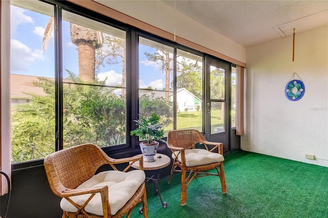 sunroom / solarium featuring a healthy amount of sunlight