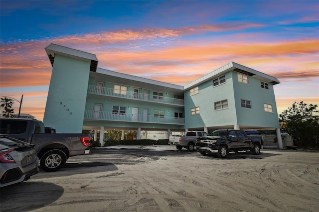 view of outdoor building at dusk