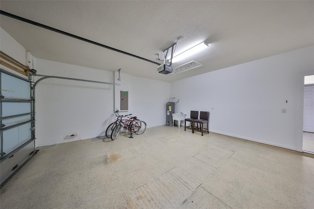 garage with electric panel, electric water heater, and a garage door opener