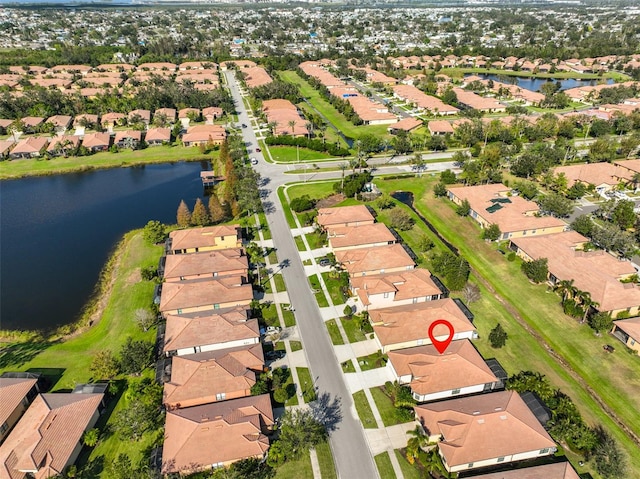 drone / aerial view featuring a water view