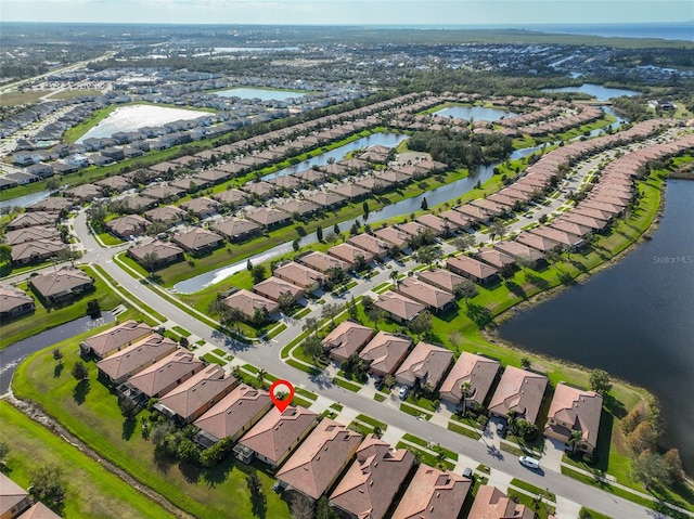 drone / aerial view featuring a water view