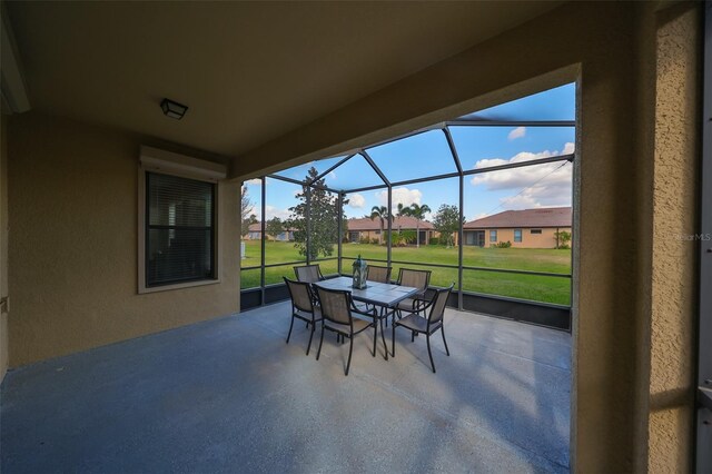 5721 Sunset Falls Dr, Apollo Beach, FL 33572 - sunroom featuring outdoor dining area and a residential view