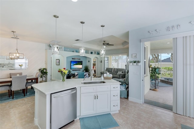 kitchen with white cabinetry, dishwasher, a healthy amount of sunlight, and sink