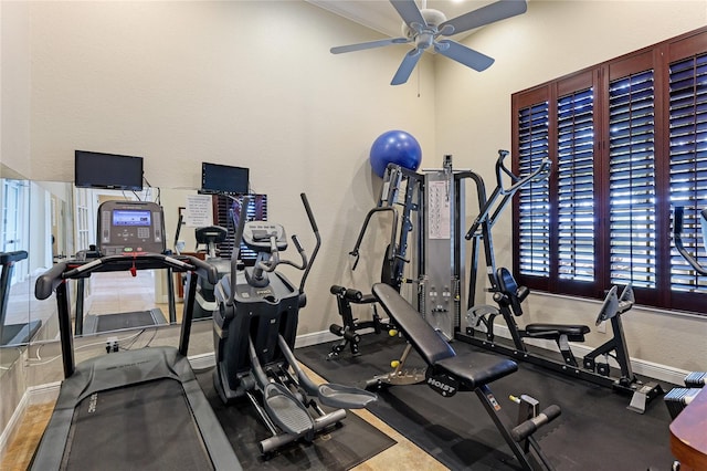 workout area featuring ceiling fan