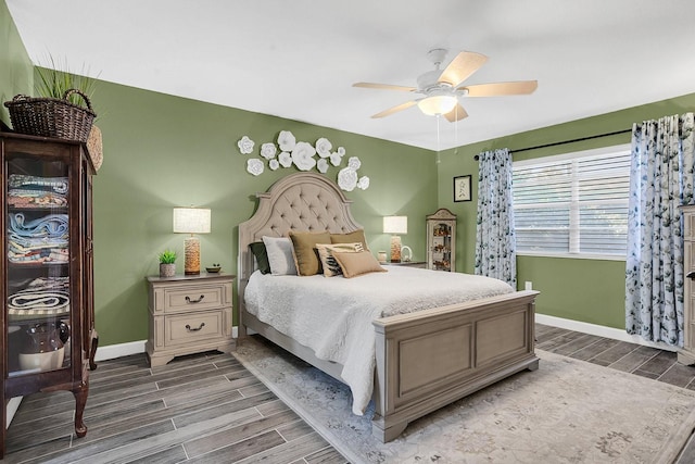 bedroom featuring ceiling fan and wood-type flooring