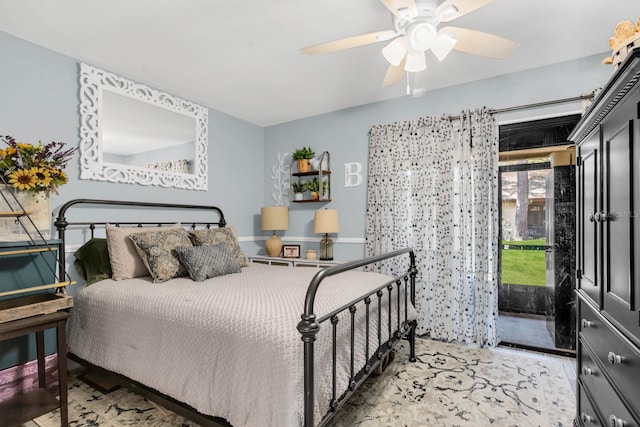 bedroom with ceiling fan and access to outside