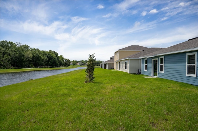 view of yard with a water view