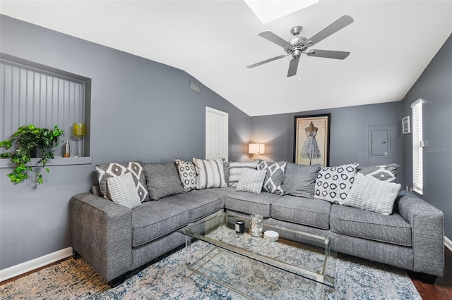 living room with dark hardwood / wood-style floors, vaulted ceiling, and ceiling fan