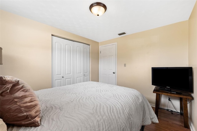 bedroom featuring a closet and hardwood / wood-style floors