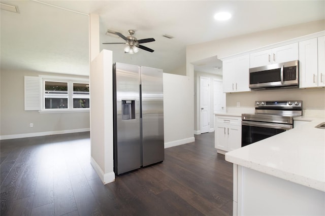 kitchen with white cabinets, ceiling fan, dark hardwood / wood-style flooring, and appliances with stainless steel finishes