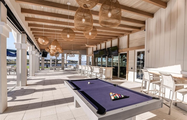 game room featuring beamed ceiling, billiards, wood ceiling, and wooden walls