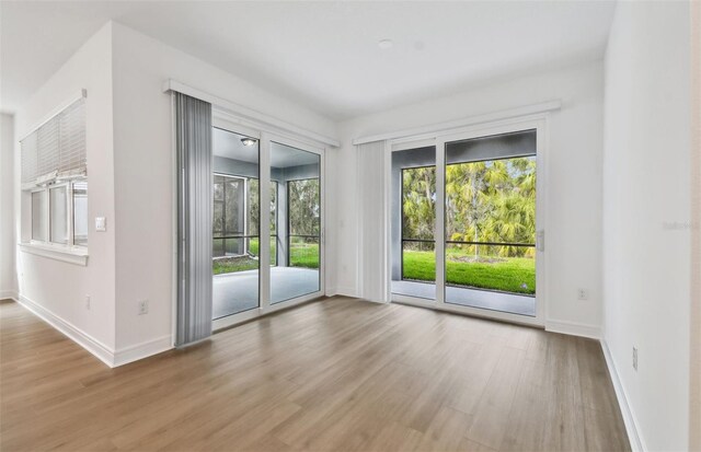 doorway to outside featuring light hardwood / wood-style flooring