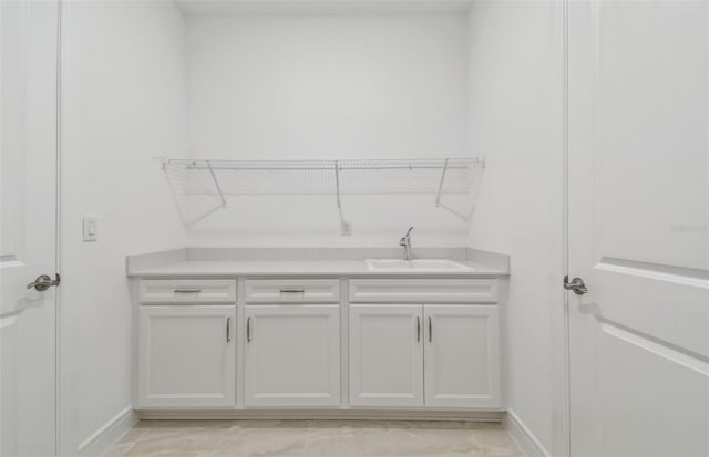 laundry area featuring sink