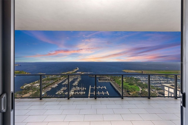 balcony at dusk with a water view