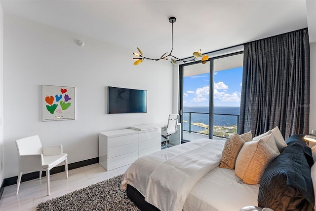 bedroom featuring floor to ceiling windows