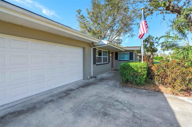 exterior space with a garage