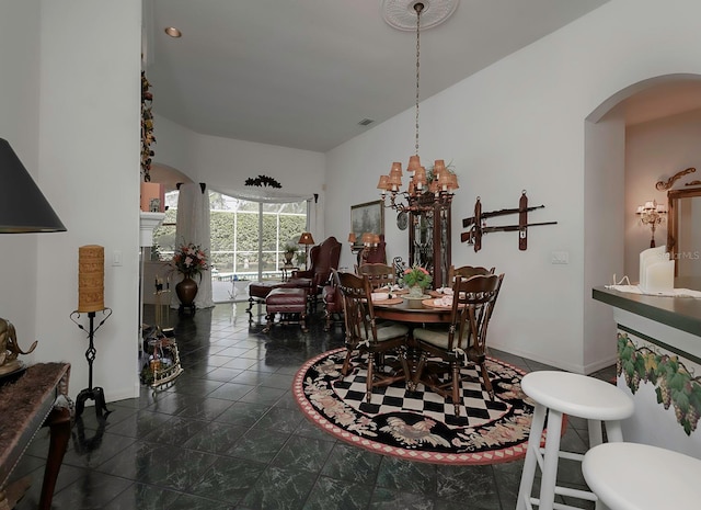 dining room with a notable chandelier