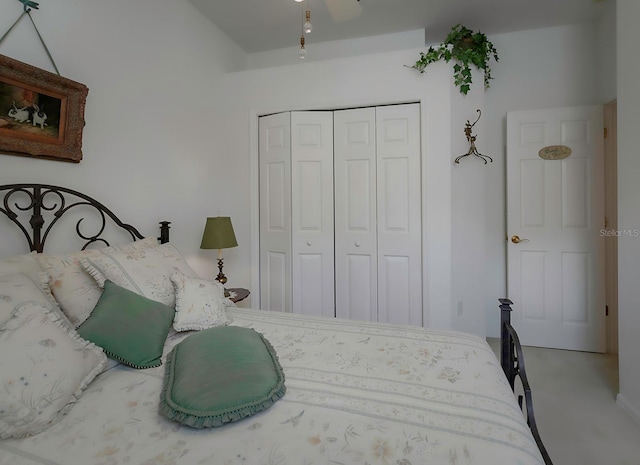 bedroom with carpet flooring and a closet