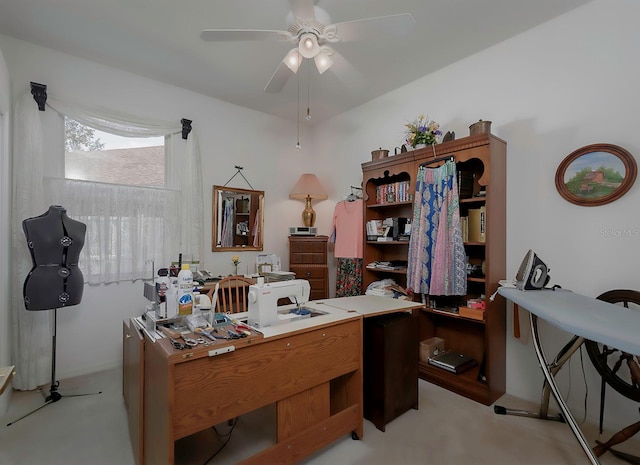 office with ceiling fan and light carpet