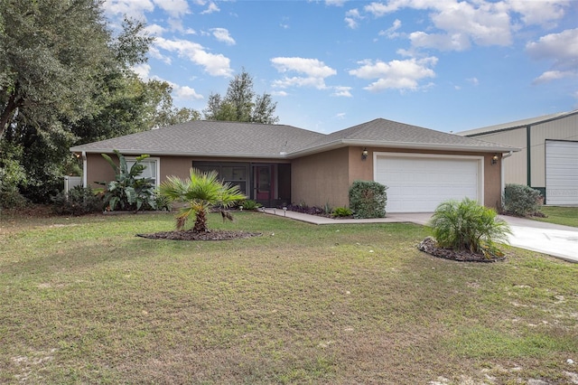 ranch-style house with a garage and a front yard