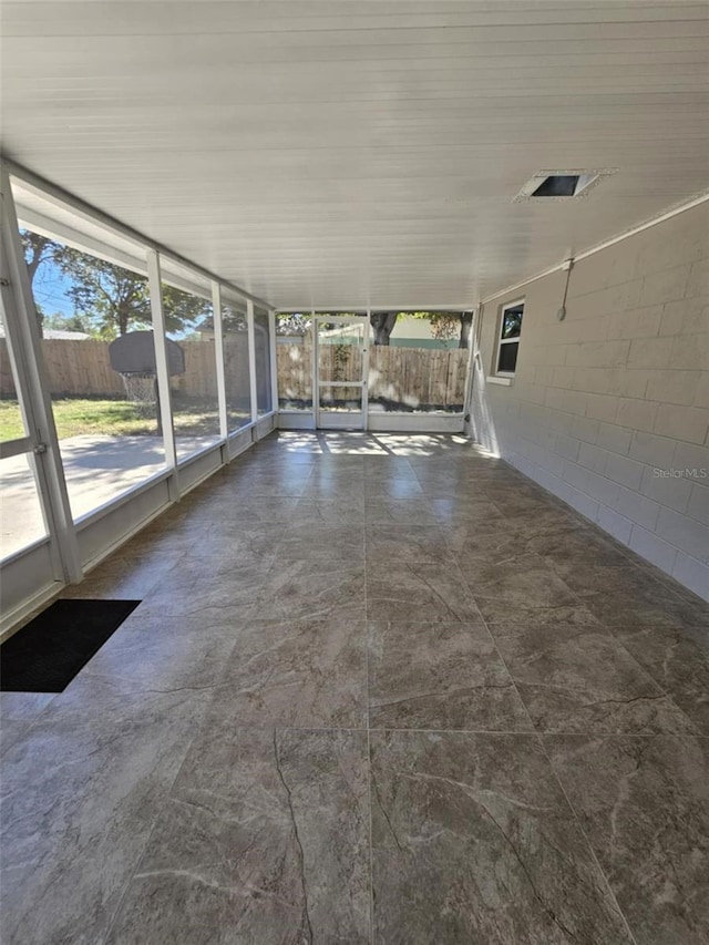 view of unfurnished sunroom