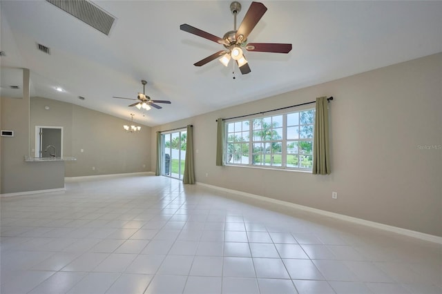 spare room featuring ceiling fan with notable chandelier, sink, vaulted ceiling, and light tile patterned flooring