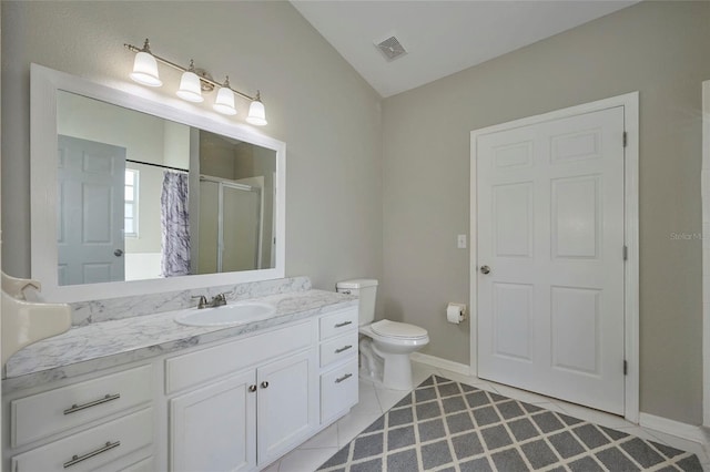 bathroom with vanity, lofted ceiling, tile patterned floors, a shower with curtain, and toilet