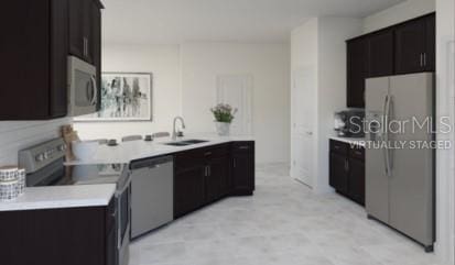 kitchen featuring sink and stainless steel appliances