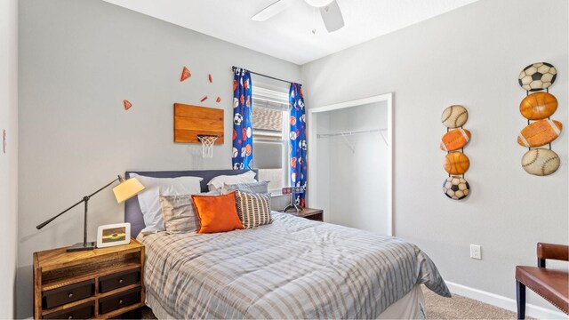 bedroom with carpet floors, a closet, and ceiling fan