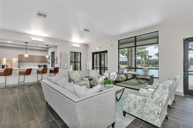 living room featuring dark hardwood / wood-style floors