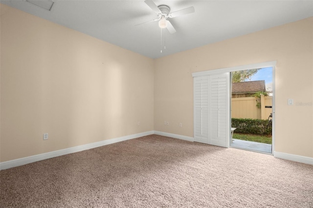 unfurnished room with carpet and ceiling fan