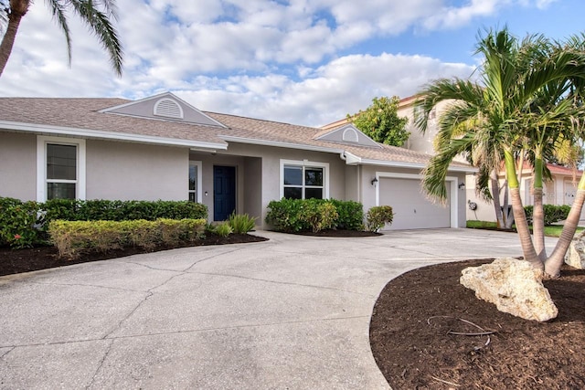 ranch-style home with a garage