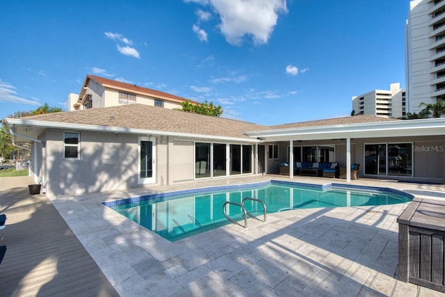 view of pool featuring an outdoor hangout area and a patio